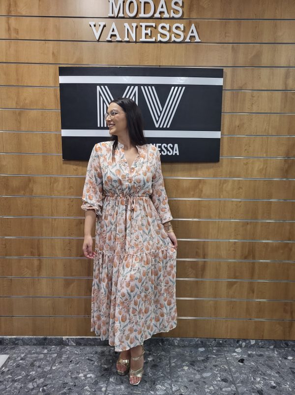 Vestido Gasa con estampado floral naranja y con cintura elástica.