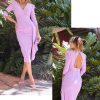 Vestido corto para boda con abertura en pierna izquierda y espalda semi-descubierta.