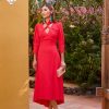 Vestido corto para eventos como bodas o comuniones con nudo en el cuello.